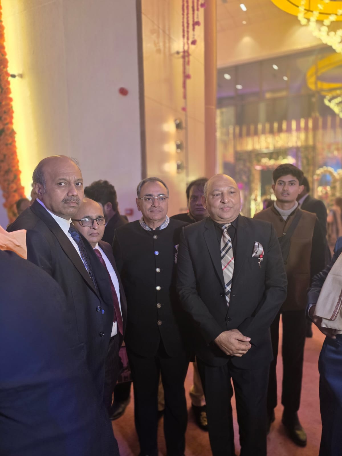 Manoj Garg with family members at an evening wedding celebration