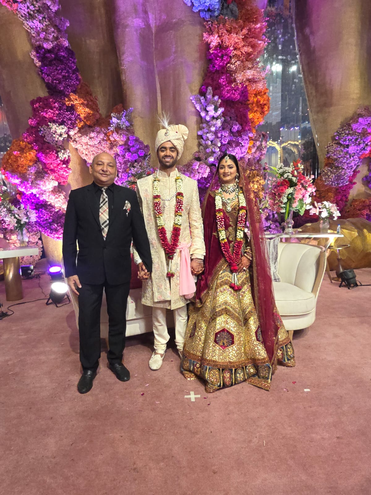 Manoj Garg with a newly married couple