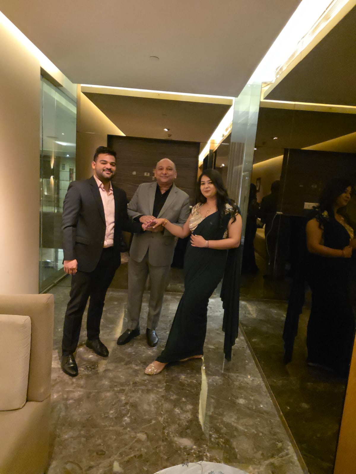 Manoj Garg with a couple during a family meeting